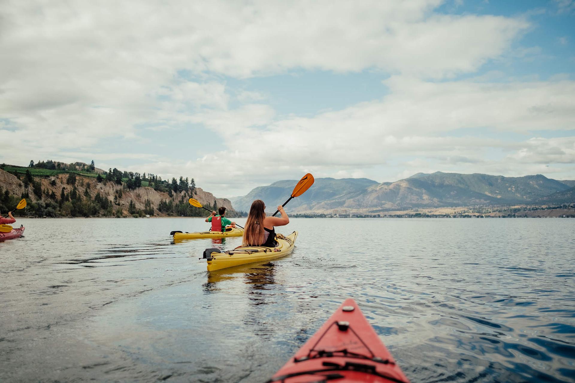 A group of people sea kayaking