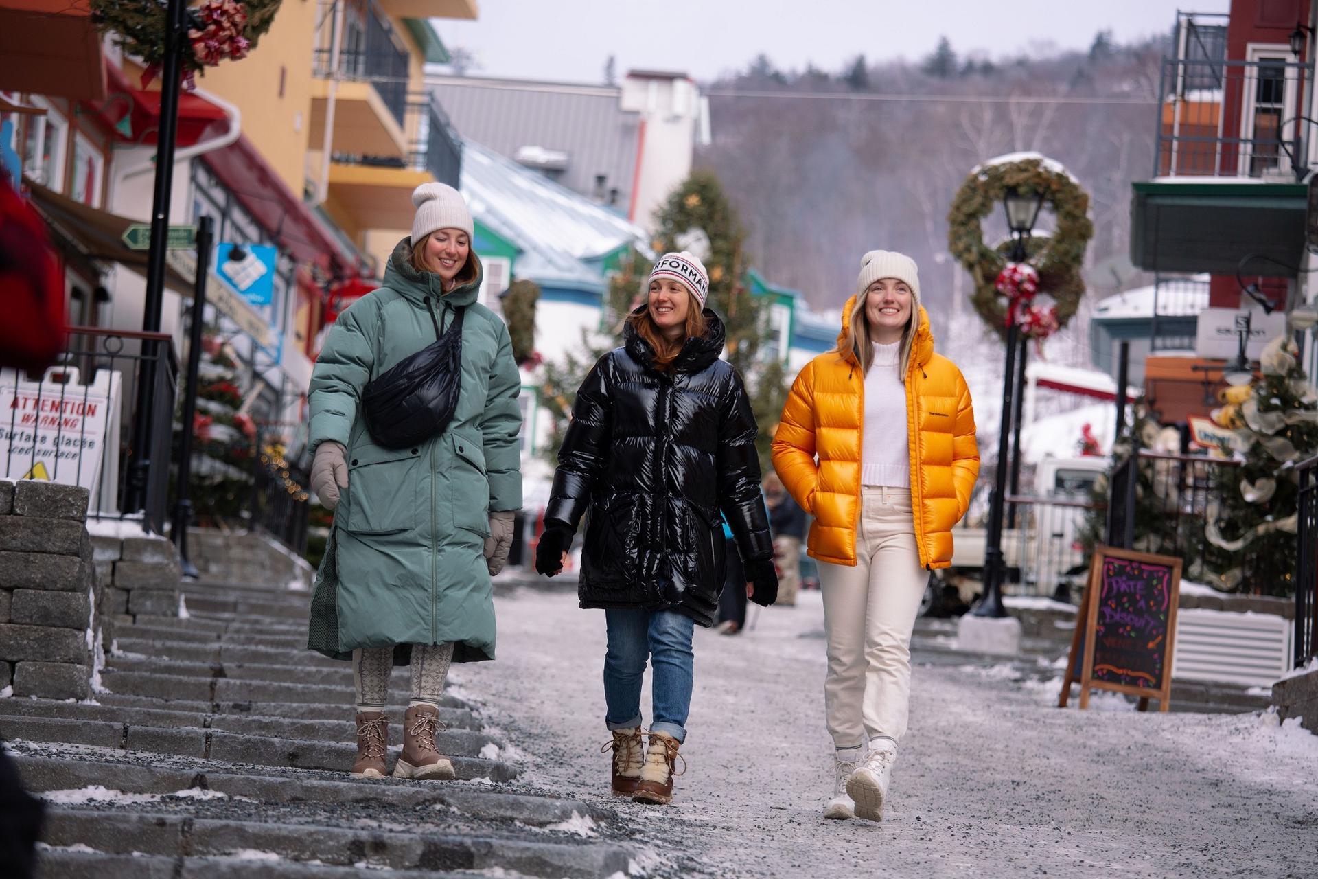 Chloé, Maxime and Justine wander the Mont Tremblant village 